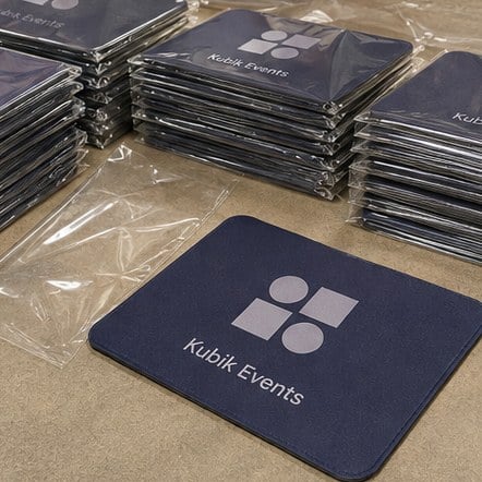 Customized desk mats for events and merch